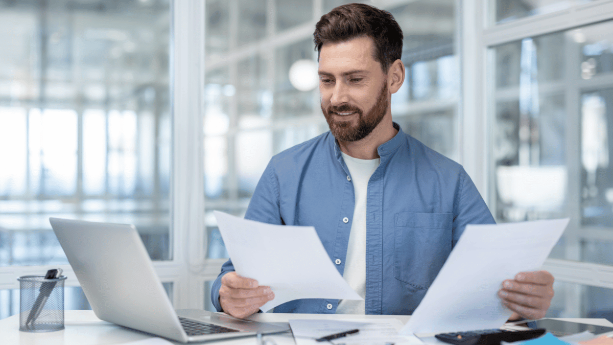 Someone looking at what could be financial statements